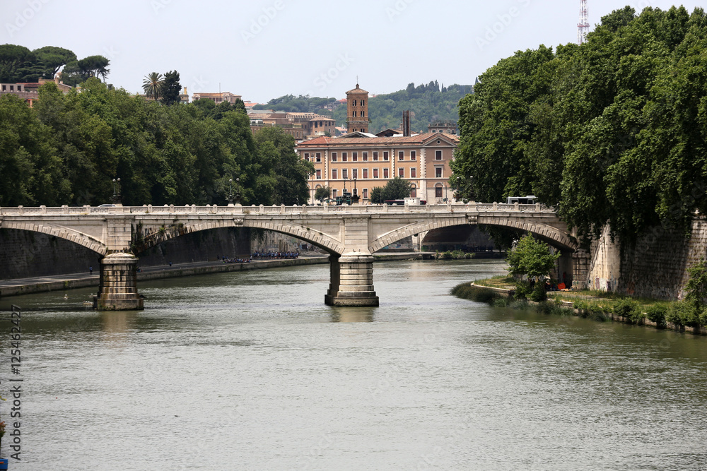 Old bridge and Tiber river in Rome . Italy