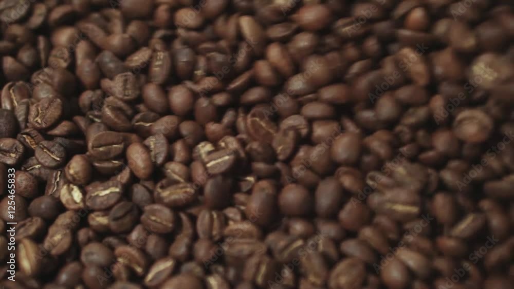 Cooling process of fresh roasted coffee beans. Mixing process of fresh roasted coffee beans. No people around. Inside shooting. Aromatic atmosphere. Cooling process of fresh roasted coffee beans. Mixing process of fresh roasted coffee beans. No people around. Inside shooting. Aromatic atmosphere.
