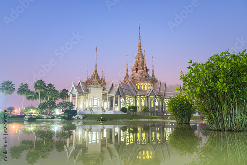 Twilight and reflex Thai Temple, Wat Non Kum at Nakhon Ratchasima Province, Thailand.