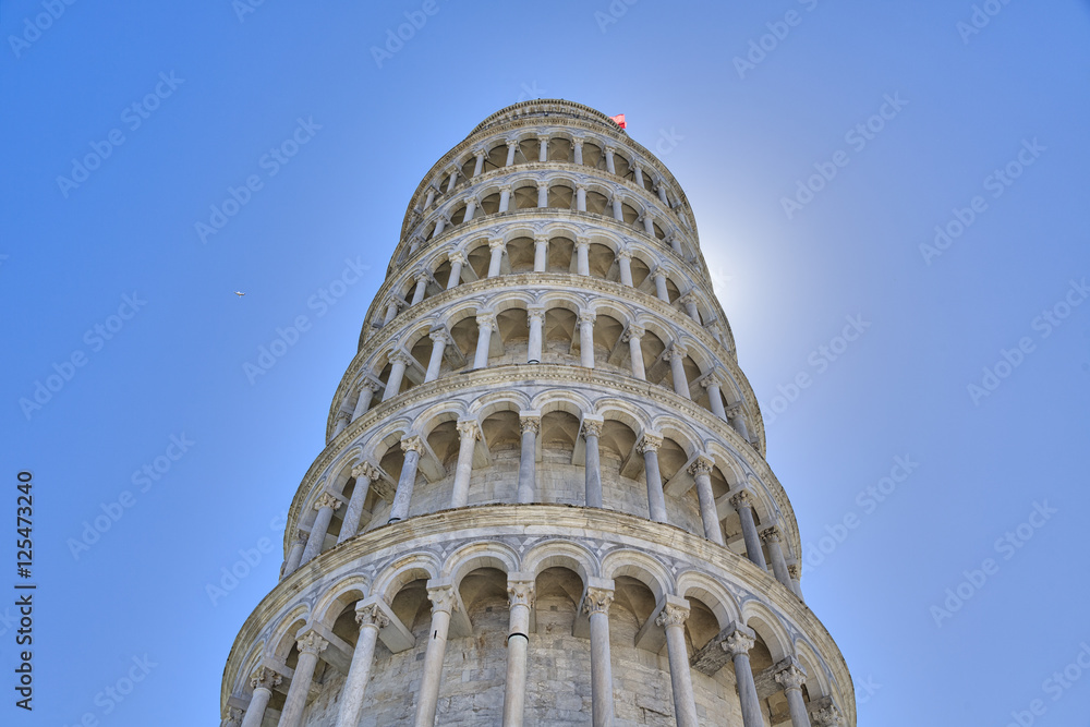 Leaning tower of Pisa isolated on the blue sky