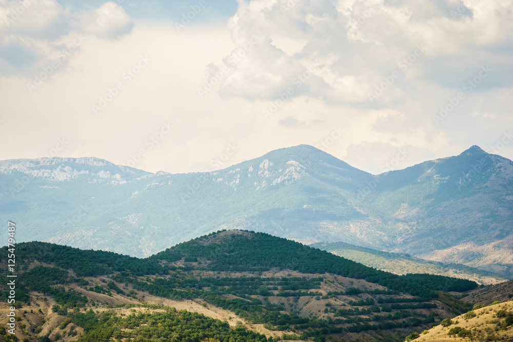 Panoramic views of mountain peaks and blue sky