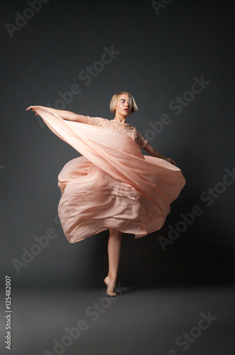 Woman dancing in chiffon dress