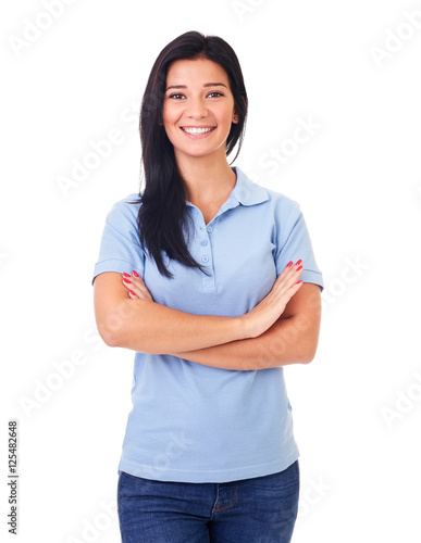 Woman in blue polo shirt with arms crossed
