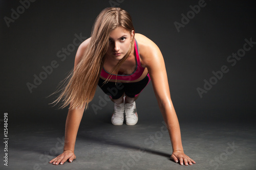 Woman making push-ups