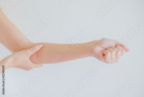 soft focus on hand of woman feel elbow pain that are sign of Rhe