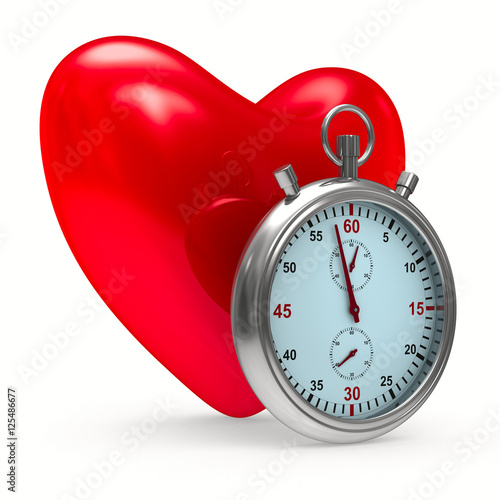 heart and stop watch on whi...
