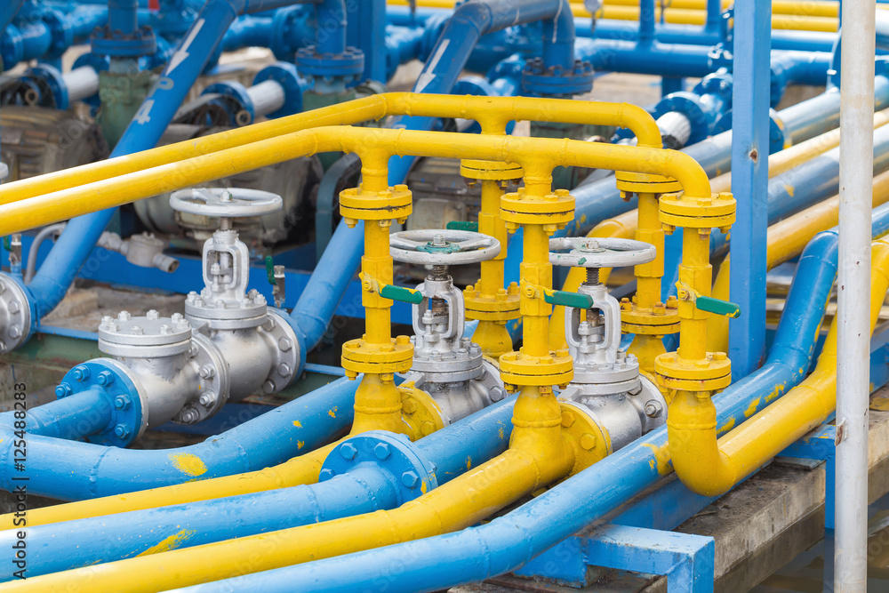 Valves at gas plant, Pressure safety valve selective focus.