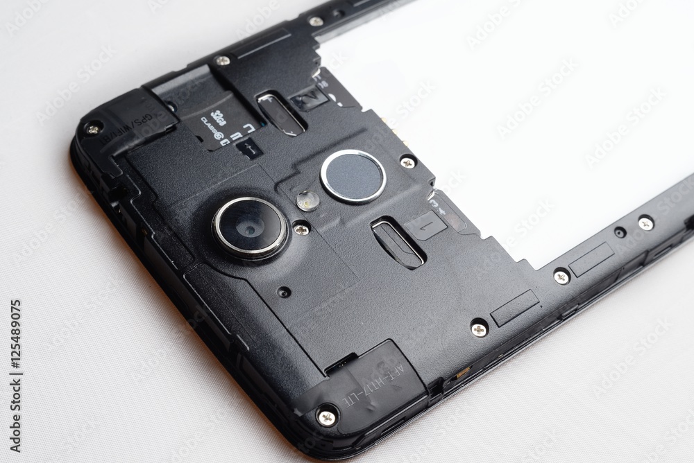 Inside modern mobile phone with fingerprint sensor isolated Inside modern mobile phone with fingerprint sensor isolated