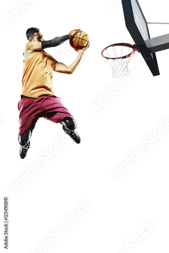 Basketball player in action isolated on white © 103tnn