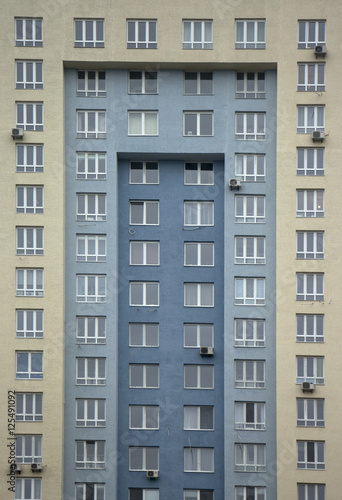 Multi-storey residential building on a background of the sky