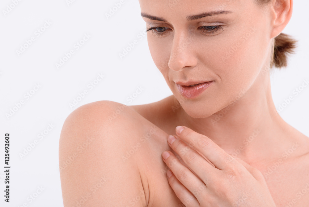 Happy woman enjoys skincare treatment Happy woman enjoys skincare treatment