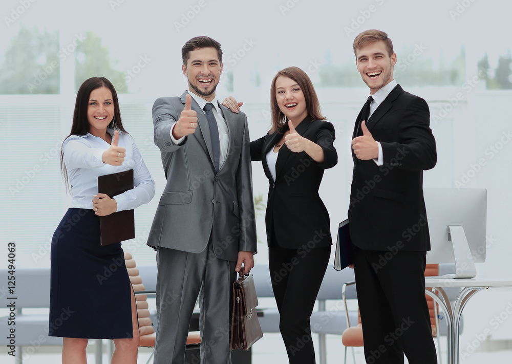 Successful business people looking happy and confident Successful business people looking happy and confident