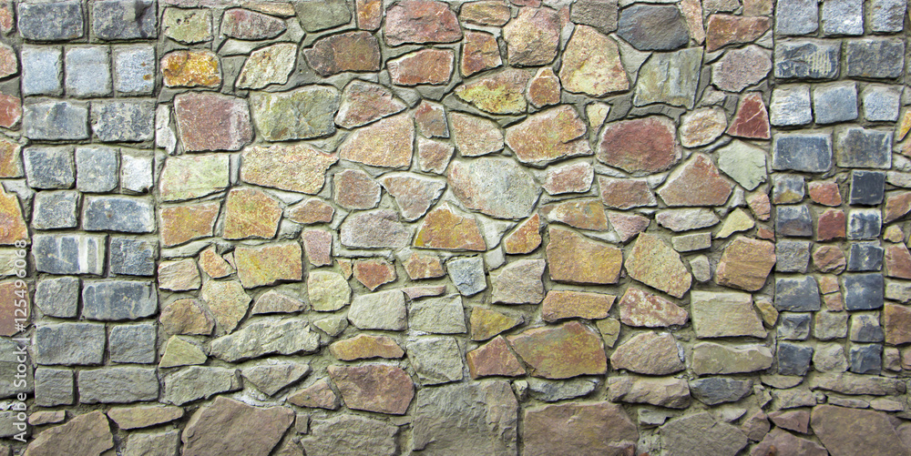 Obraz premium wall of granite boulders of different colors
