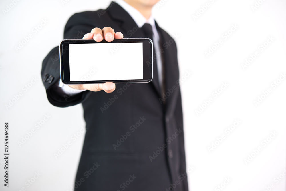 businessman in a suit holding a mobile phone. businessman in a suit holding a mobile phone.