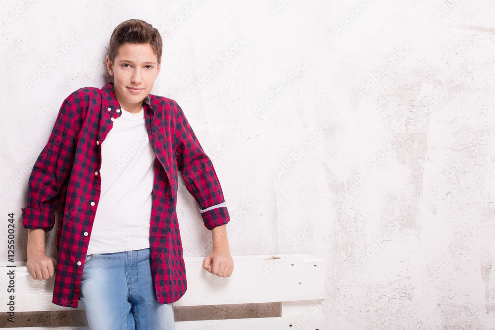 Young teenage boy posing.