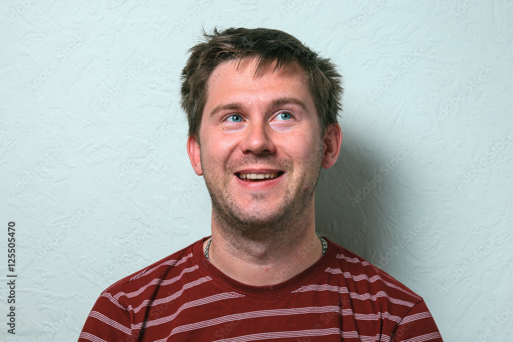 Fototapeta premium Close up of a funny young man. The collage of young man with different emotion. emotional card. 