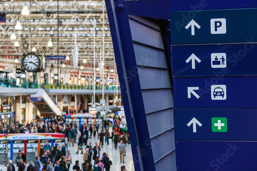 Directional signs at Waterloo station in London photo