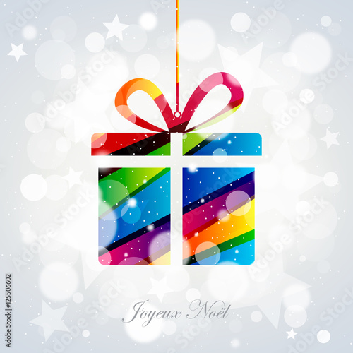Cadeau coloré suspendu sur bokeh