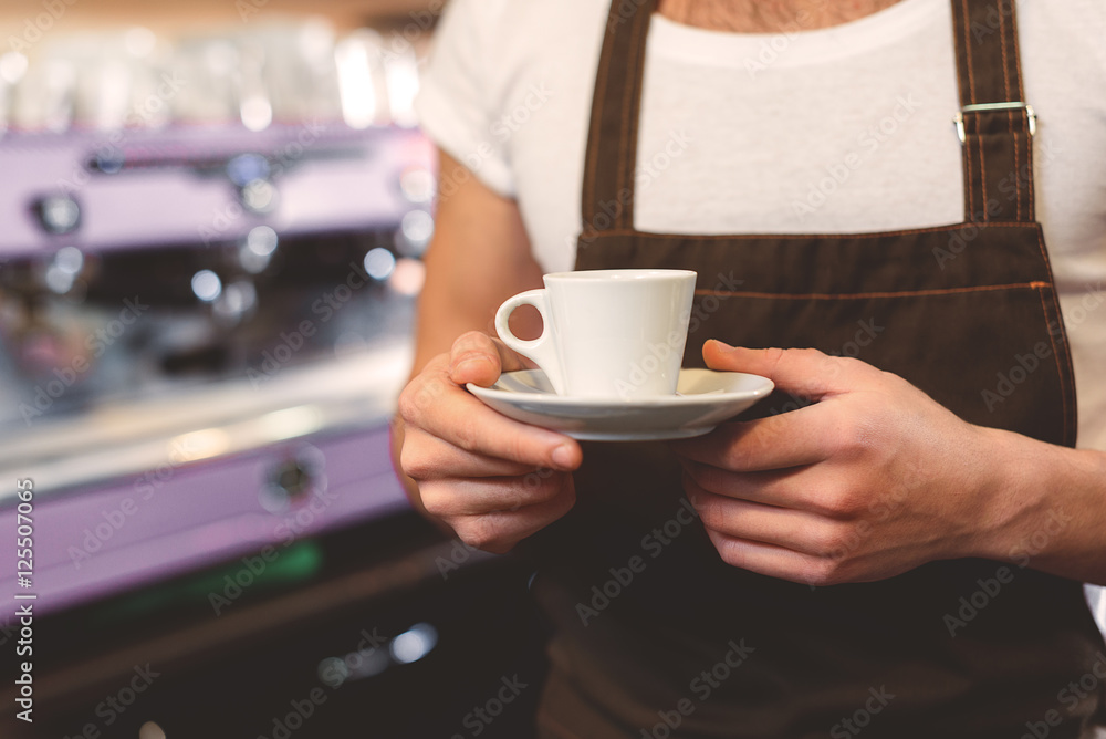 cropped image of a person holding the cup cropped image of a person holding the cup