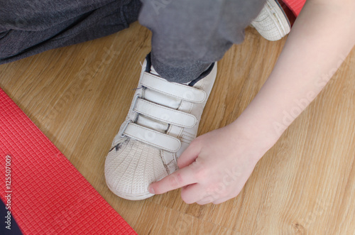 boy is making sports exercises