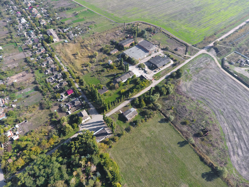 Abandoned and plundered ether-oil factory in the village. photo