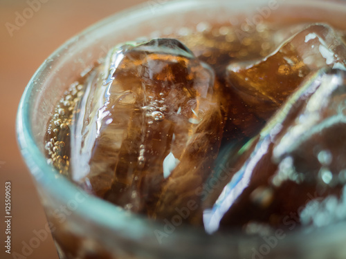 glass of cola with ice