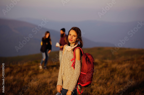 Pretty girl with red backpack