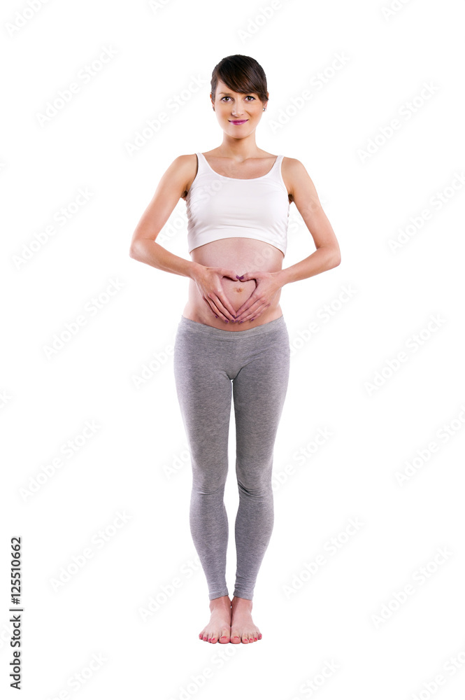 Beautiful pregnant woman, heart - isolated over a white backgrou Beautiful pregnant woman, heart - isolated over a white backgrou