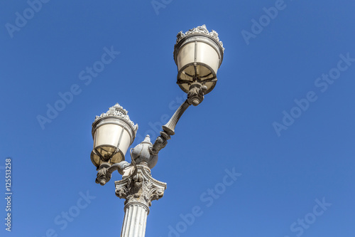 old  lantern downtown  Aix en provence under blue sky