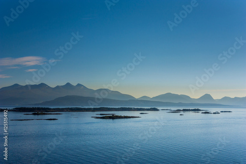 Peaks in the sunset and the sea, Molde, Norway photo