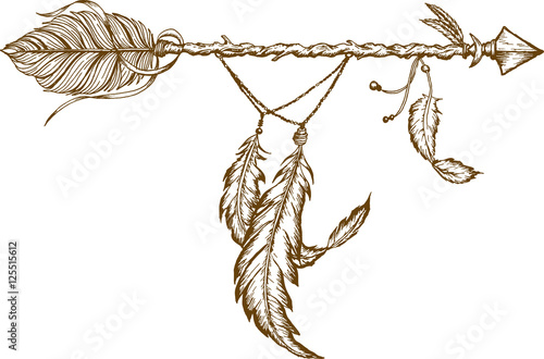 Arrow in ethnical pattern with feathers