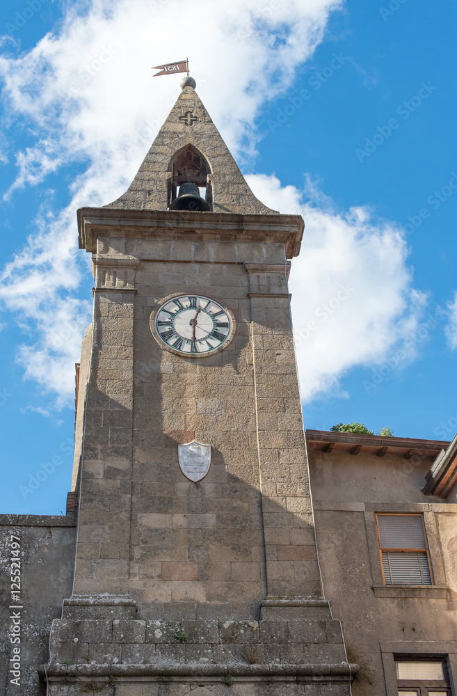 ancient clock tower with roman numerals