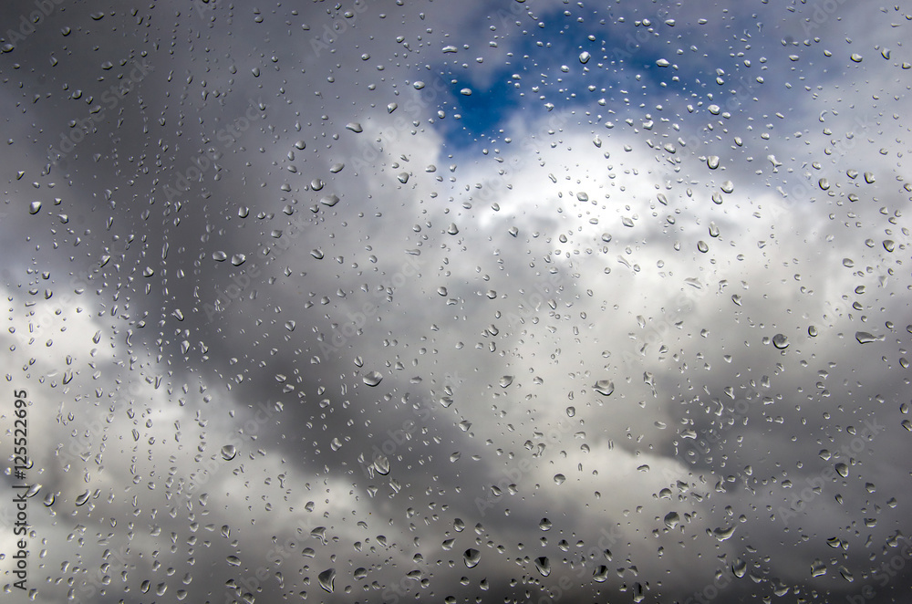 Raindrops on glass closeup Raindrops on glass closeup