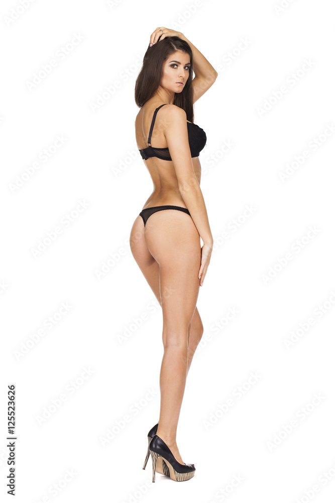 Full length portrait of young woman wearing black underwear Full length portrait of young woman wearing black underwear