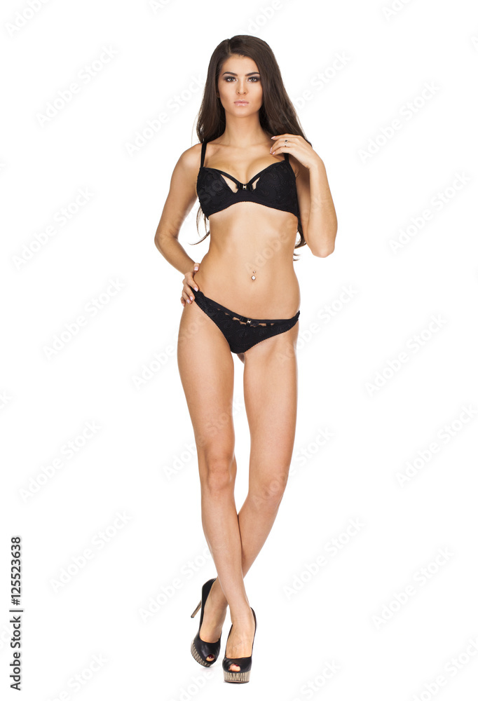 Full portrait of sexy lady in black lingerie, isolated on white Full portrait of sexy lady in black lingerie, isolated on white