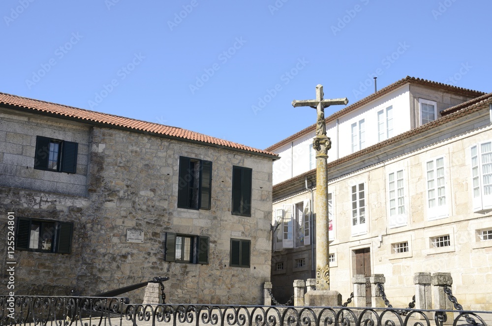 Cross in a plaza in Tui, Galicia, Spain