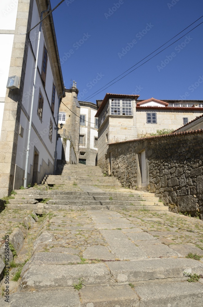 Stairs in stone street in Tui, Galicia, Spain