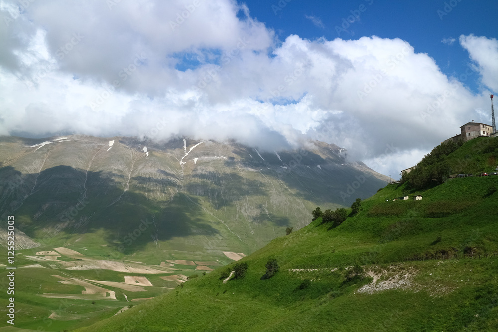 Castelluccio and the valley (Norcia region, Italy) as seen before the devastating earthquake of October 2016. Now the town of Castelluccio is almost completely destroyed. Castelluccio and the valley (Norcia region, Italy) as seen before the devastating earthquake of October 2016. Now the town of Castelluccio is almost completely destroyed.
