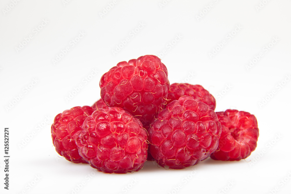 raspberries with leaves isolated on white background raspberries with leaves isolated on white background