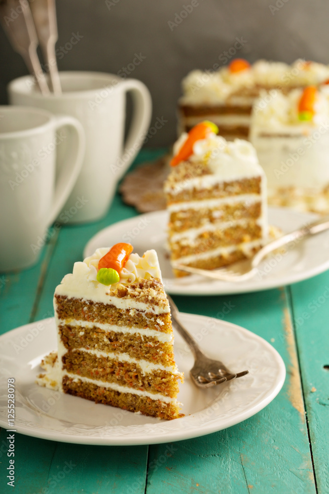 Slice of carrot cake with cream cheese frosting Slice of carrot cake with cream cheese frosting