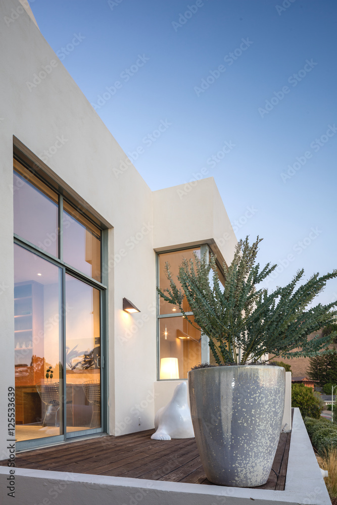Fototapeta premium Large glass sliding door within contemporary home.