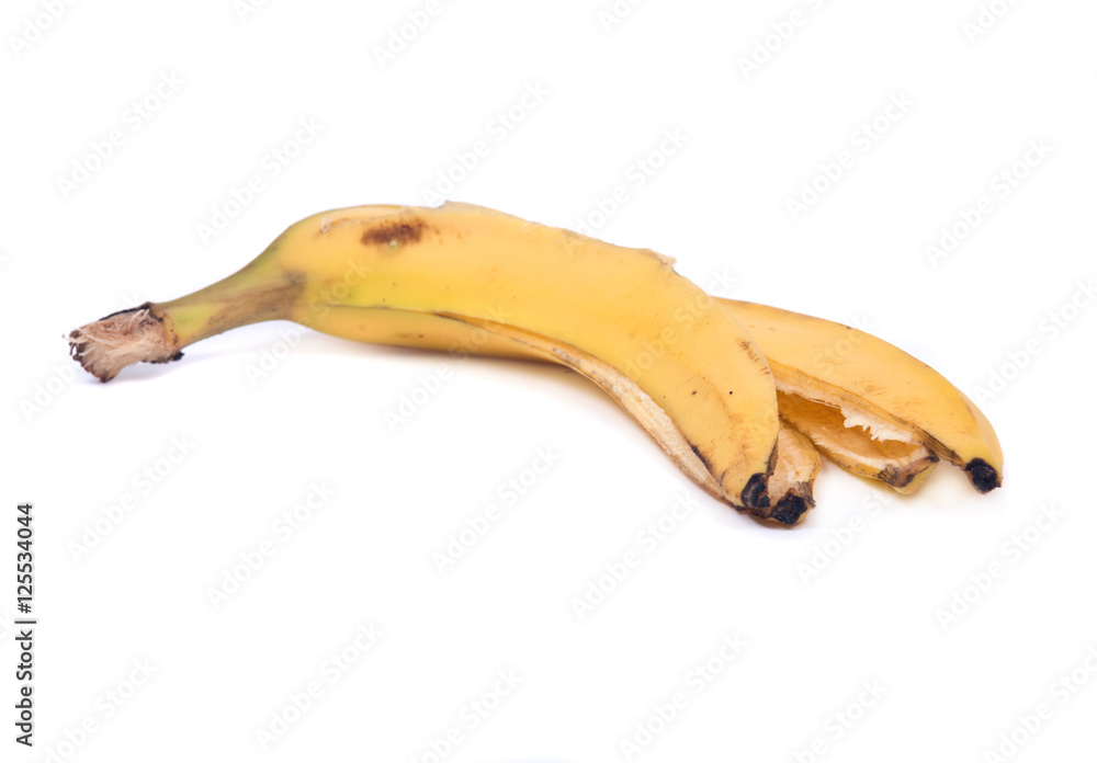 Peeled organic banana isolated on white background Peeled organic banana isolated on white background