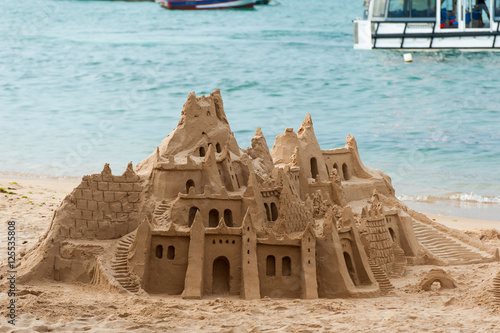 Castle made of sand on beach in Buzios, Rio de Janeiro, Brazil