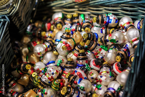 Colorful close up details of christmas fair market. Balls decora