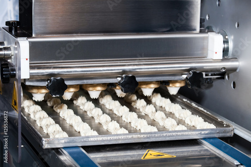 Biscuit depositing machine, equipment in bakery industry