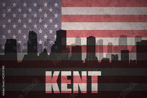 abstract silhouette of the city with text Kent at the vintage american flag