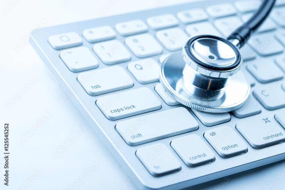Stethoscope with a modern computer keyboard Stethoscope with a modern computer keyboard