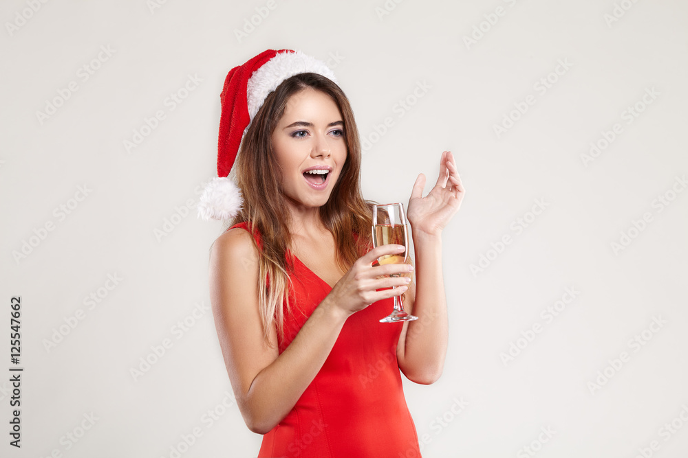 Horizontal portrait of christmas girl with wineglass on white background Horizontal portrait of christmas girl with wineglass on white background