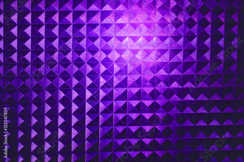 Fototapeta Naklejka Na Ścianę i Meble -  square pyramidal purple stripped pattern texture illuminated neon plastic glow