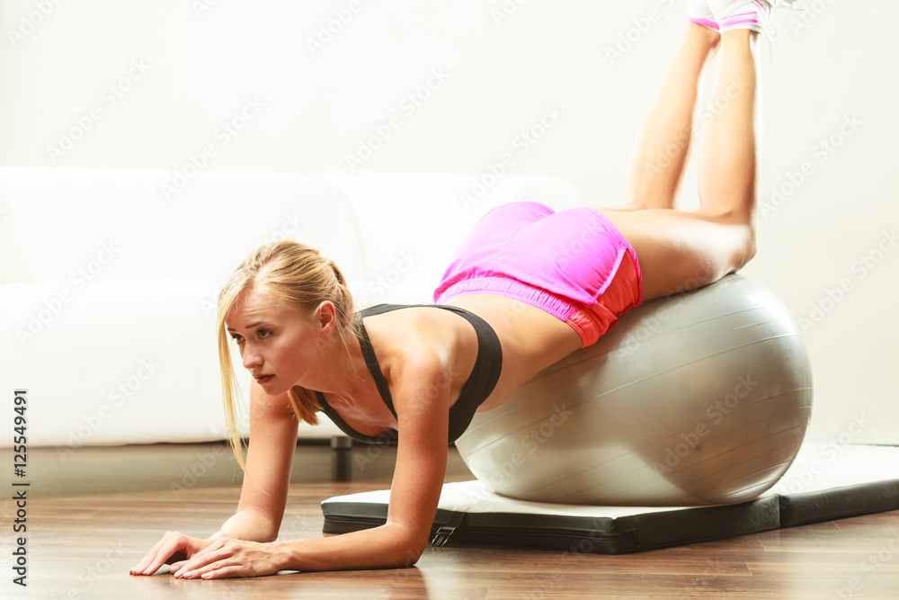woman doing fitness exercises with fit ball woman doing fitness exercises with fit ball